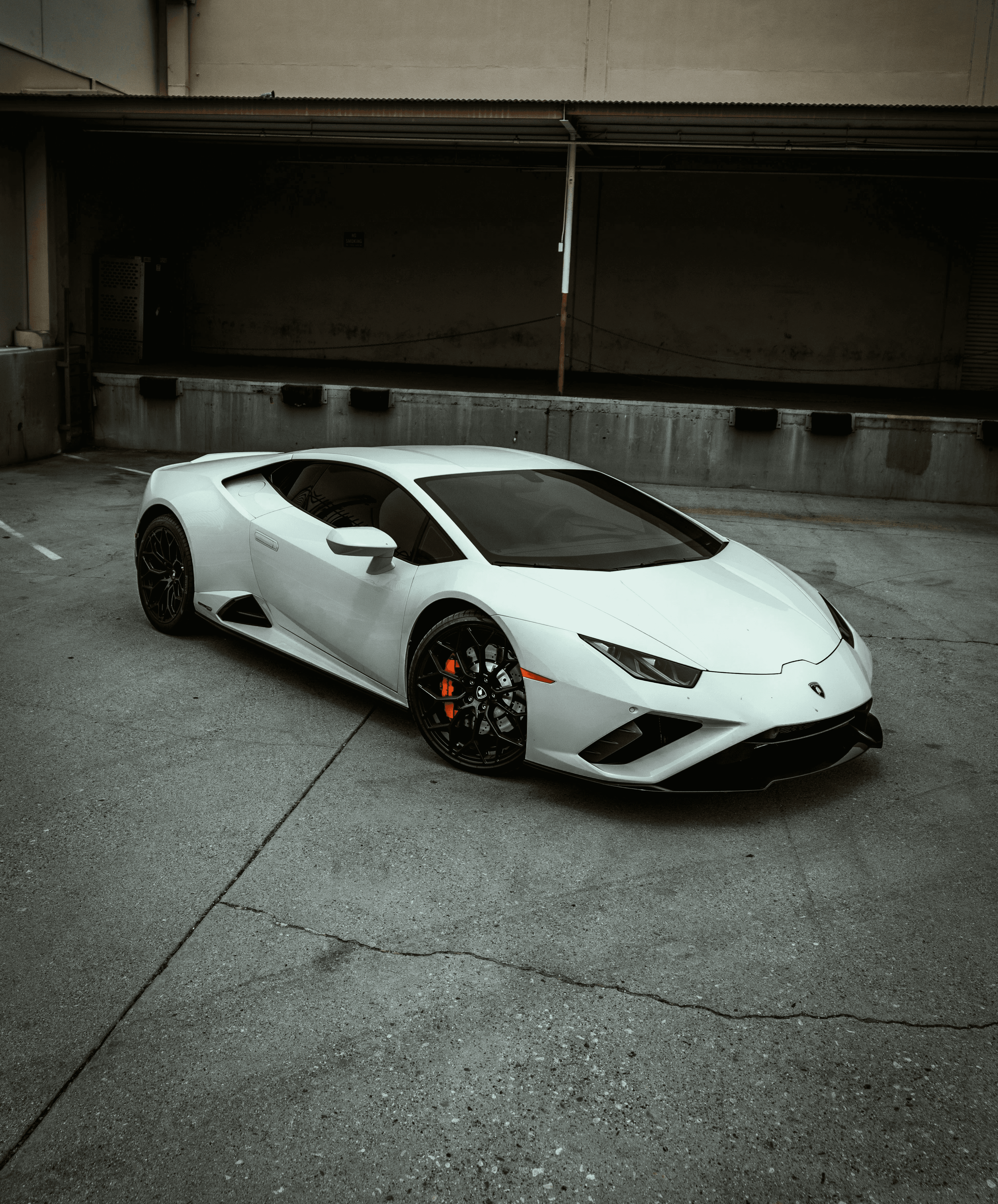 White supercar on concrete