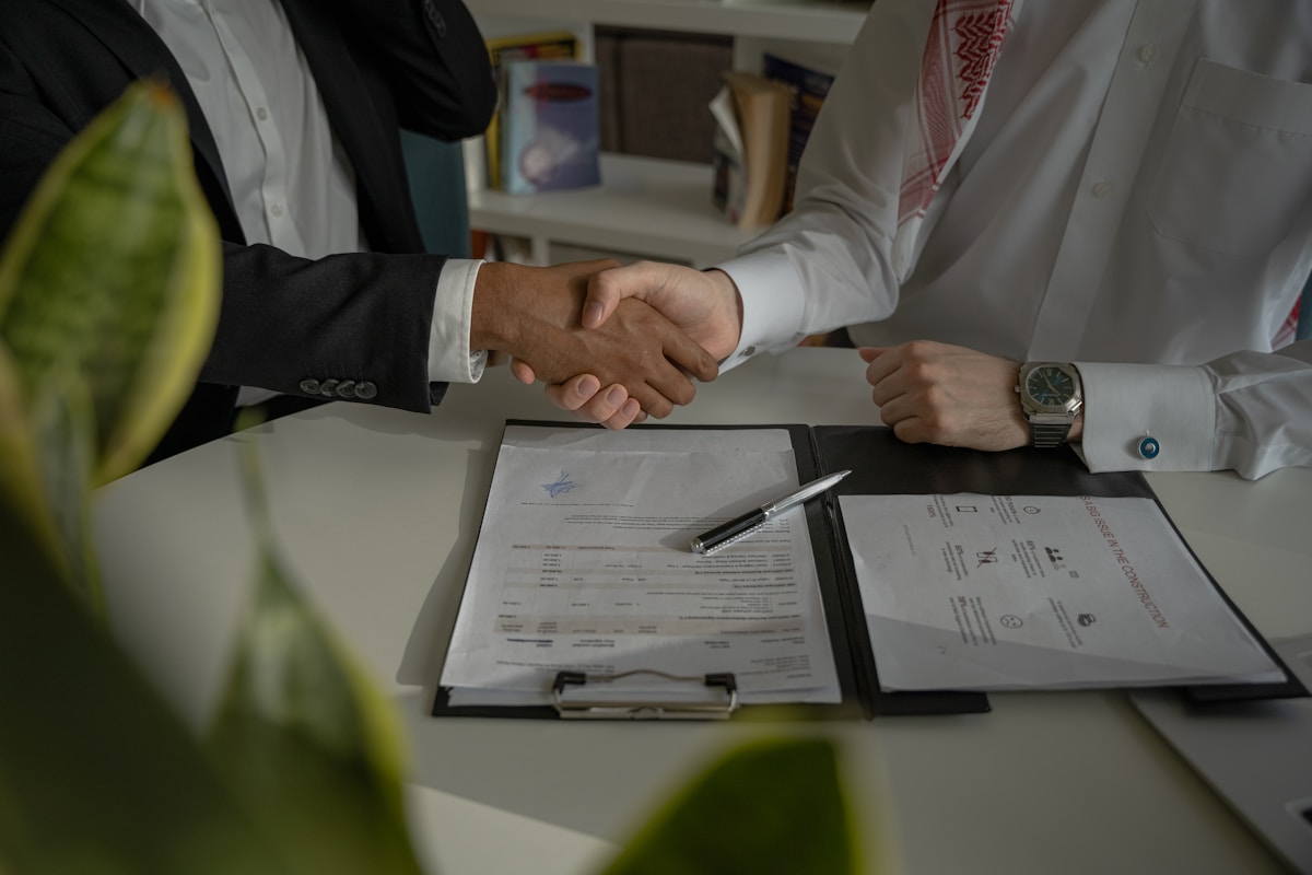 Customer signing vehicle finance paperwork